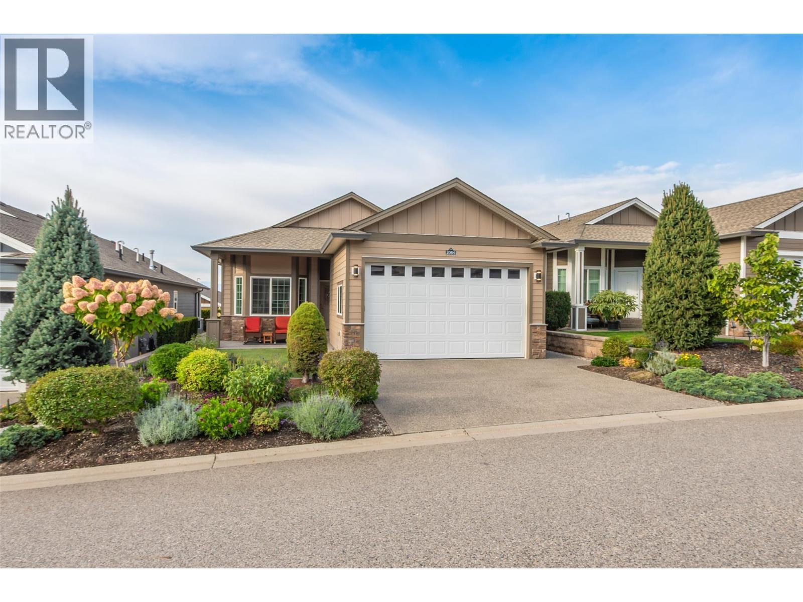 2064 Aspen Drive, Westbank, BC - Outdoor With Facade