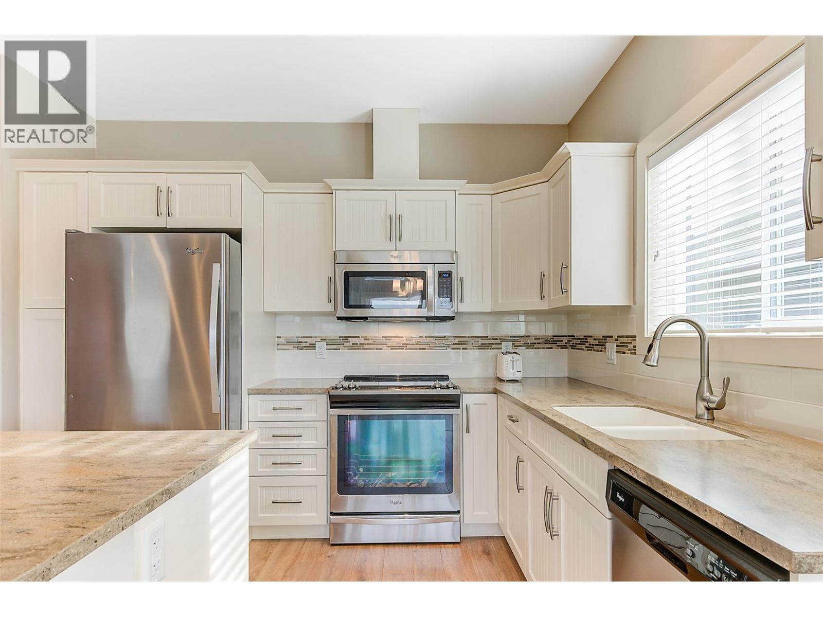 2064 Aspen Drive, Westbank, BC - Indoor Photo Showing Kitchen With Stainless Steel Kitchen With Upgraded Kitchen
