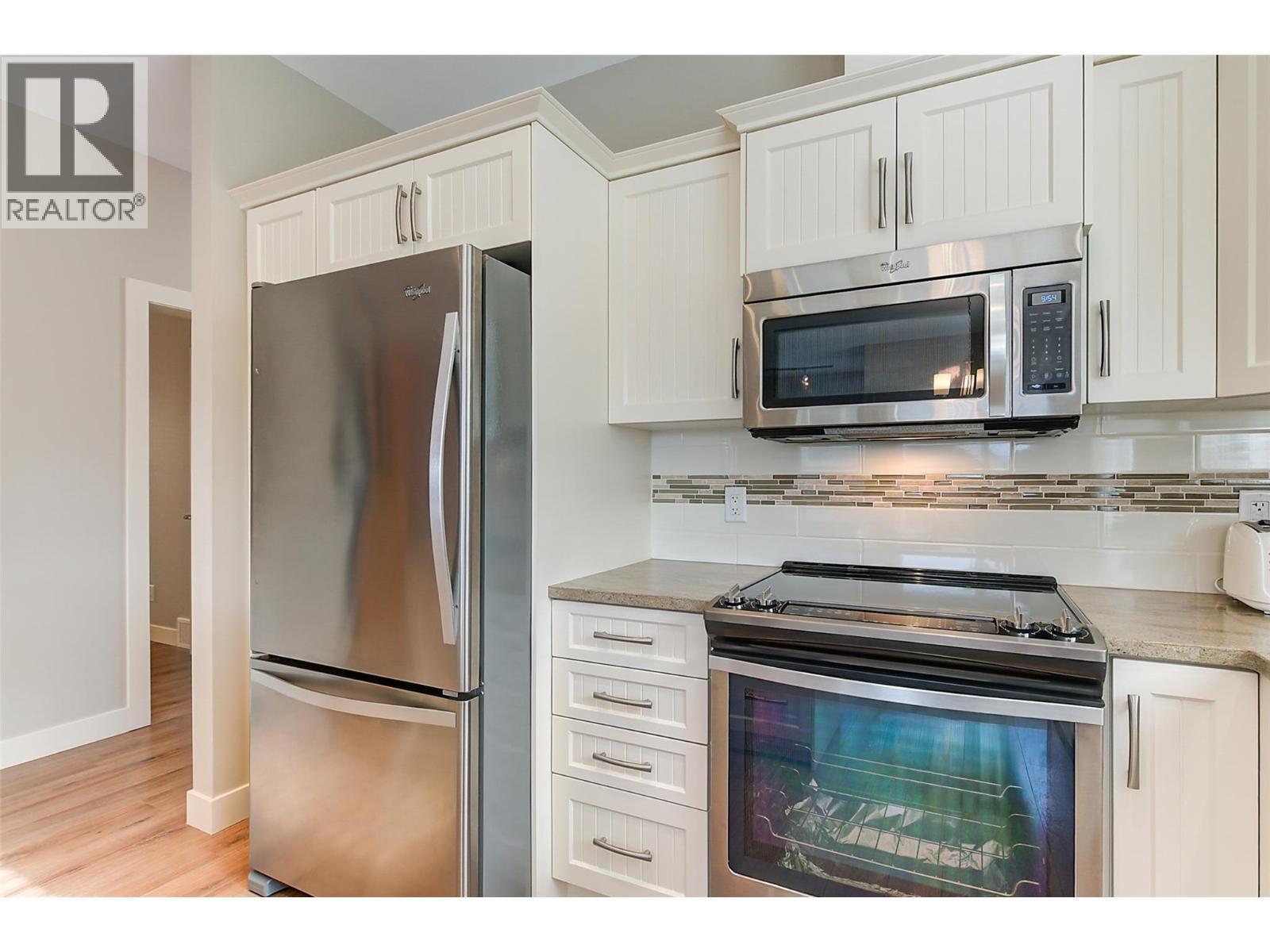 2064 Aspen Drive, Westbank, BC - Indoor Photo Showing Kitchen With Stainless Steel Kitchen