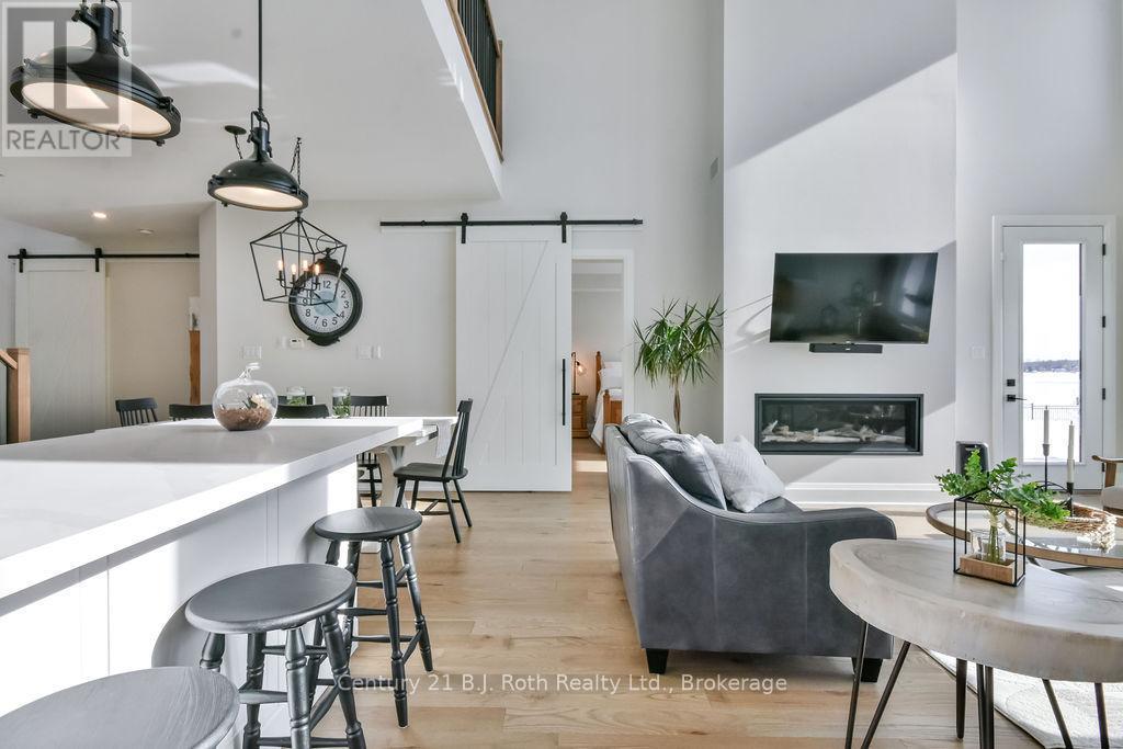 27 - 53 Dock Lane, Tay (Port Mcnicoll), ON - Indoor With Fireplace