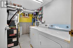 Laundry & utility room in basement -