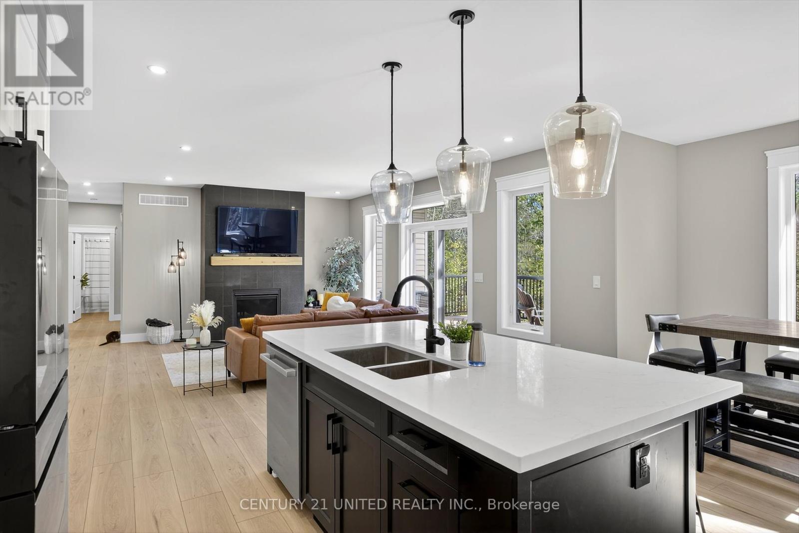 75 Riverside Boulevard, Trent Hills, ON - Indoor Photo Showing Kitchen With Fireplace With Double Sink With Upgraded Kitchen