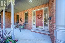Welcoming Covered Front Porch -