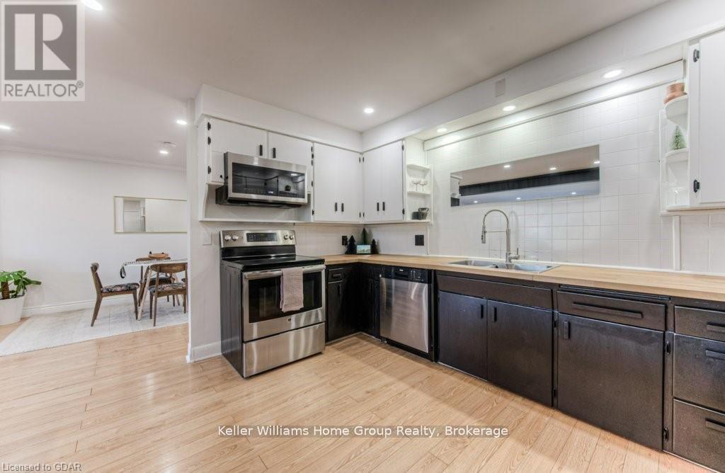 16A - 1085 Queens Boulevard, Kitchener, ON - Indoor Photo Showing Kitchen With Double Sink