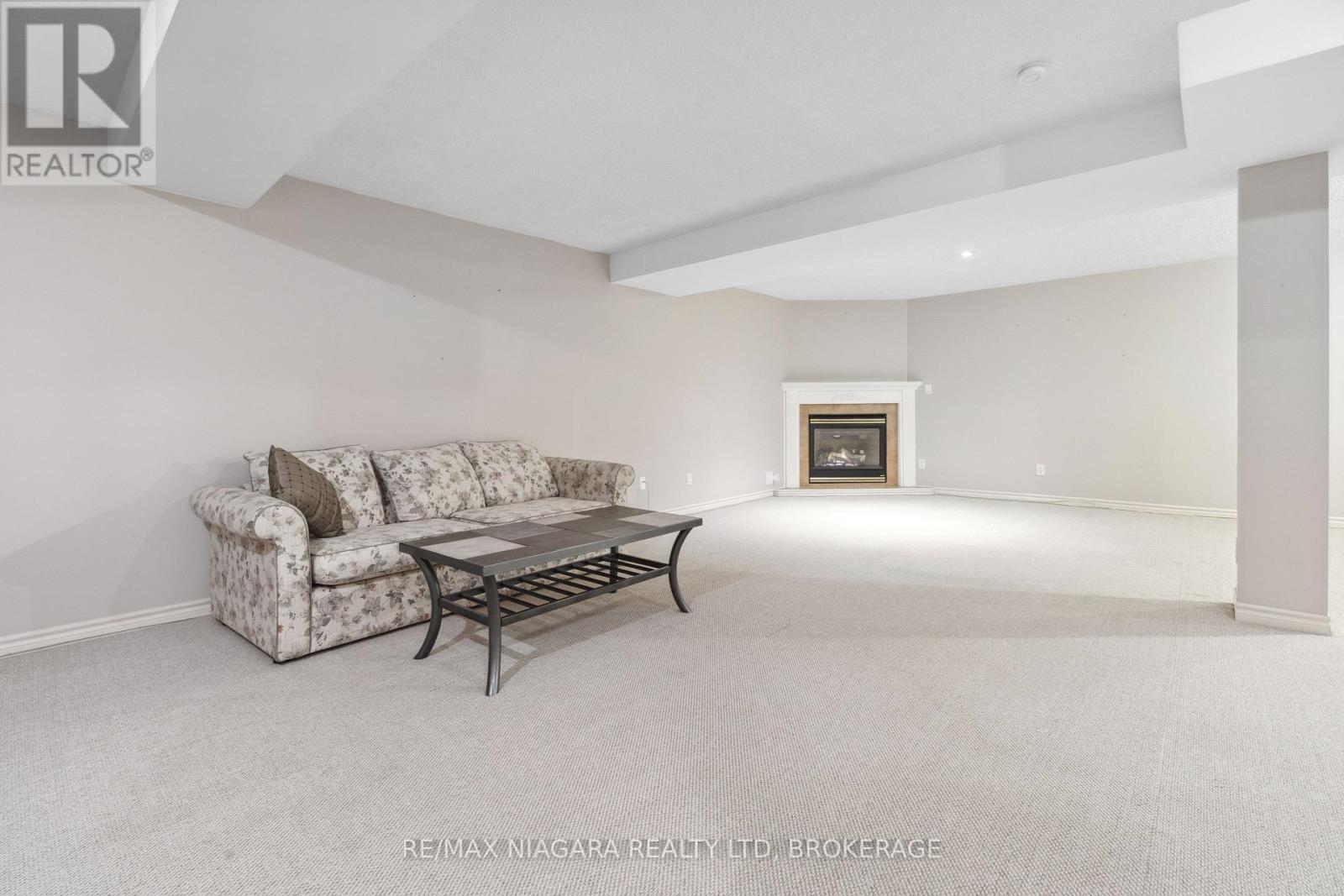 17 - 2684 Mewburn Road, Niagara Falls (Casey), ON - Indoor Photo Showing Living Room With Fireplace