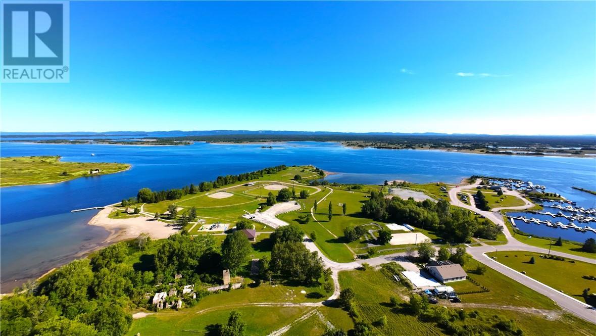 69 Robinson Street W, Little Current, ON - Outdoor With Body Of Water With View