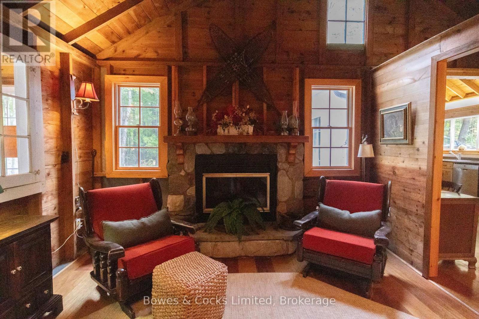 408 Couchs Road, North Kawartha, ON - Indoor Photo Showing Living Room With Fireplace