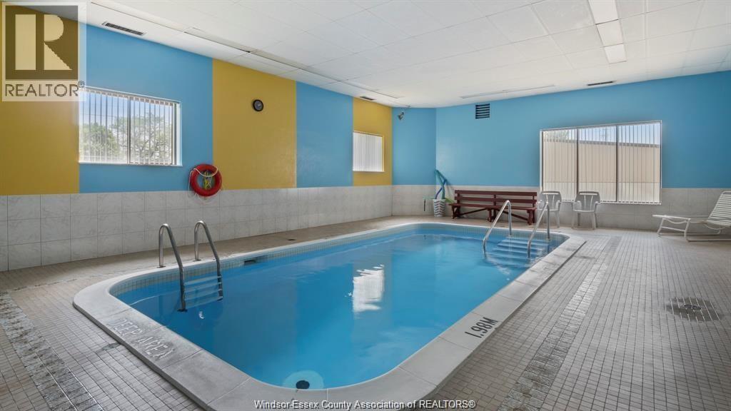 3663 Riverside Drive East Unit# 306, Windsor, ON - Indoor Photo Showing Other Room With In Ground Pool