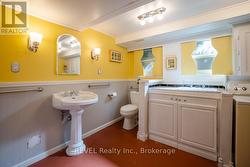 Cute 2 piece bathroom combined with the laundry -