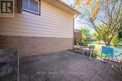 Lovely interlocking brick patio. -