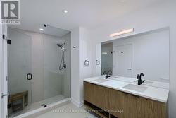 Ensuite Dual Sink Vanity with Lrg Walk in Shower -