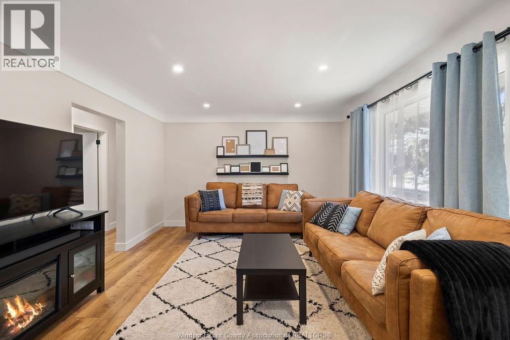 3429 Dominion, Windsor, ON - Indoor Photo Showing Living Room With Fireplace