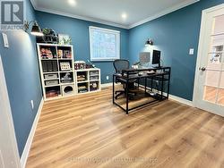 Main floor office, access to kitchen and laundry -