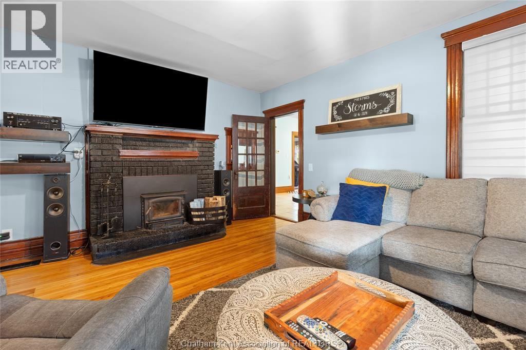 7783 Talbot Trail, Blenheim, ON - Indoor Photo Showing Living Room With Fireplace