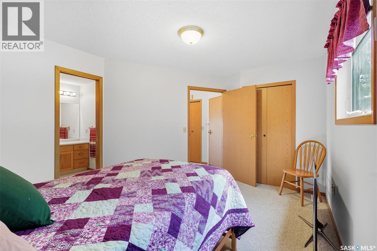 5 412 Lake Avenue, Manitou Beach, SK - Indoor Photo Showing Bedroom