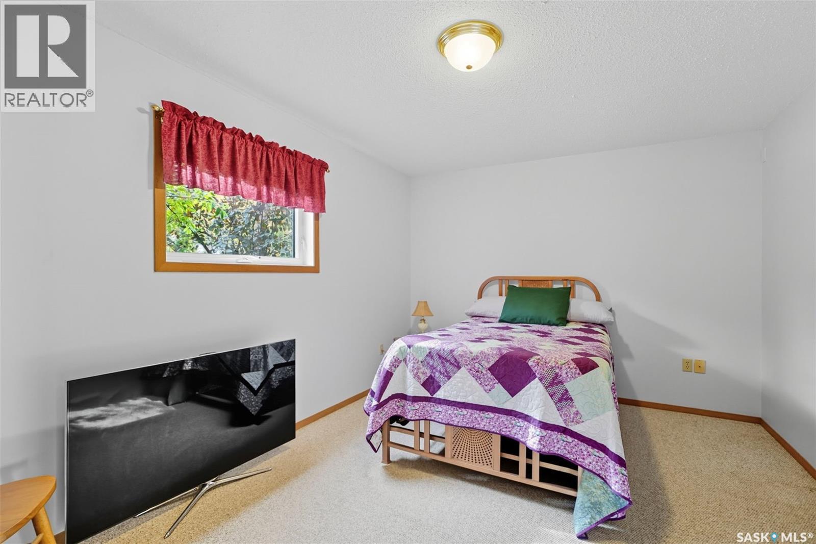 5 412 Lake Avenue, Manitou Beach, SK - Indoor Photo Showing Bedroom