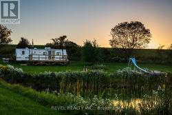 Trailer Home in Woods -