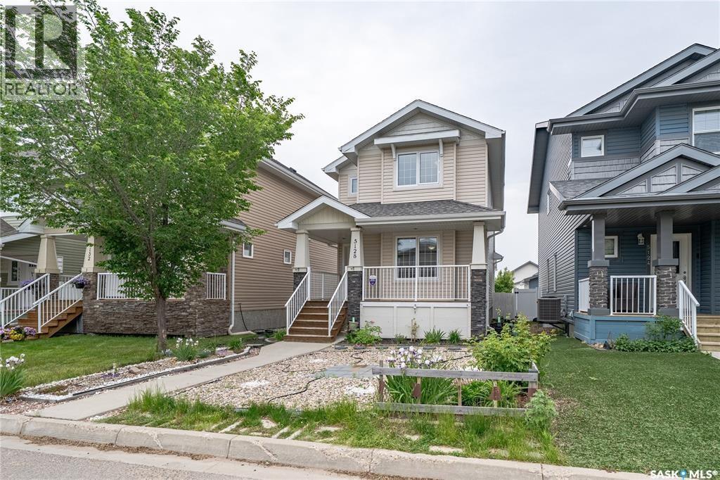 5128 Aerial Crescent, Regina, SK - Outdoor With Deck Patio Veranda With Facade