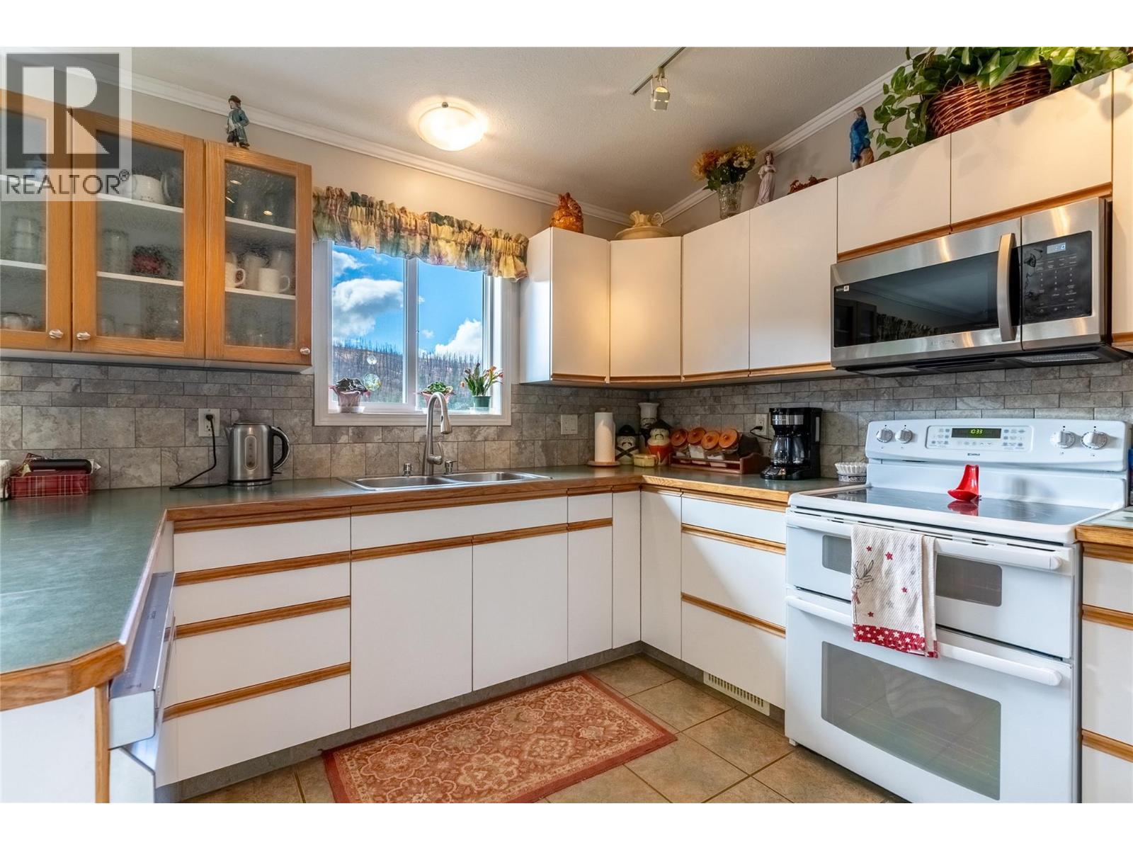 kitchen - 1424 Loon Lake Road, Loon Lake, BC - Indoor Photo Showing Kitchen With Double Sink