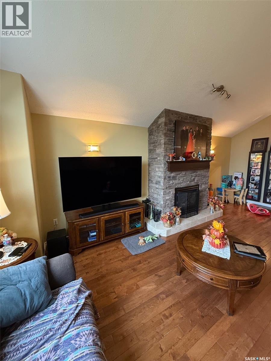 121 18Th Street W, Battleford, SK - Indoor Photo Showing Living Room With Fireplace
