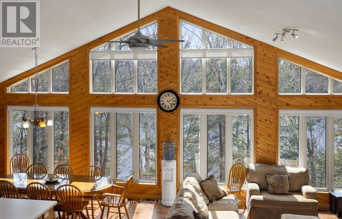 Fabulous wall of windows; Lake views! - 38 Shebeshekong Estates Road S, Carling, ON - Indoor