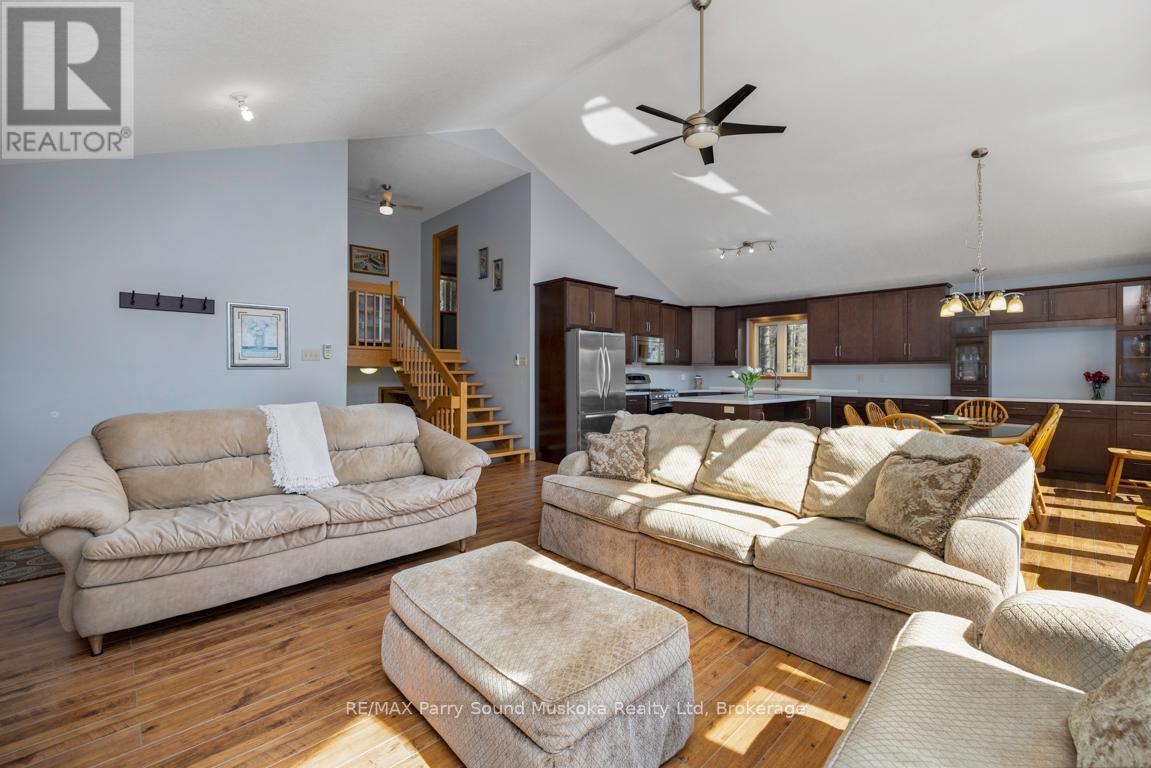 Great for Entertaining! - 38 Shebeshekong Estates Road S, Carling, ON - Indoor Photo Showing Living Room