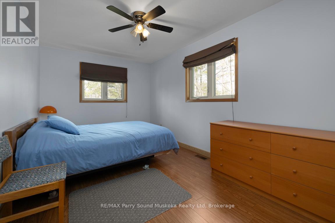 38 Shebeshekong Estates Road S, Carling, ON - Indoor Photo Showing Bedroom