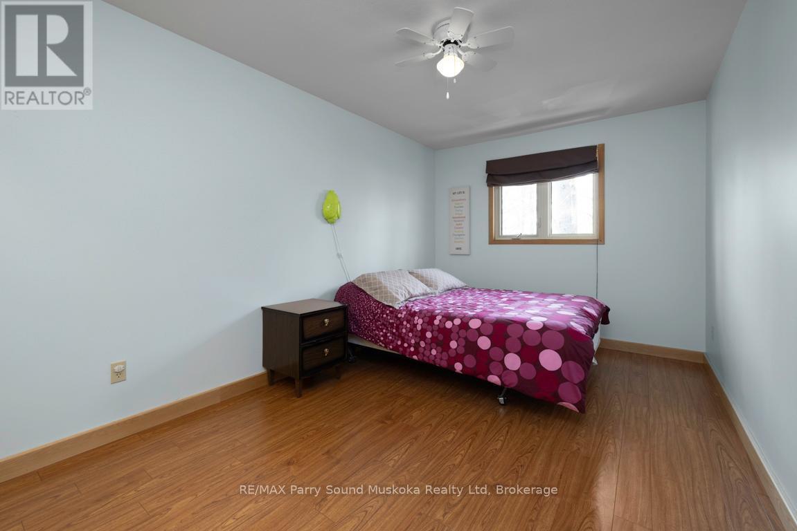 3rd bedroom, 2nd level - 38 Shebeshekong Estates Road S, Carling, ON - Indoor Photo Showing Bedroom