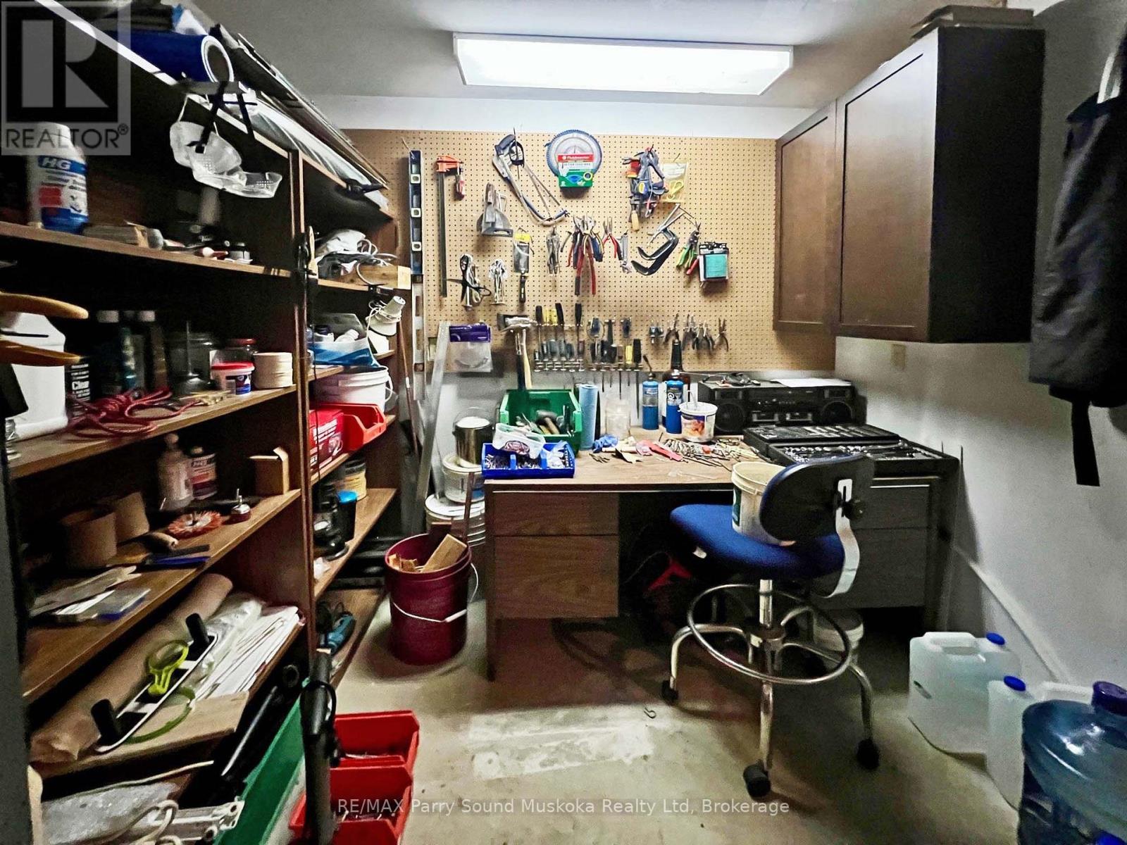 Handy workshop area - 38 Shebeshekong Estates Road S, Carling, ON - Indoor With Storage