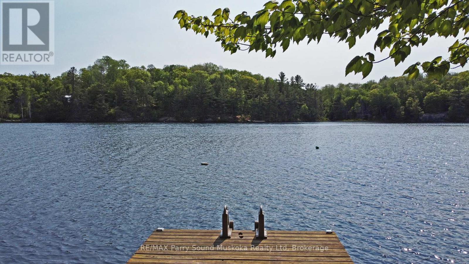 Deep water at end of dock - 38 Shebeshekong Estates Road S, Carling, ON - Outdoor With Body Of Water With View