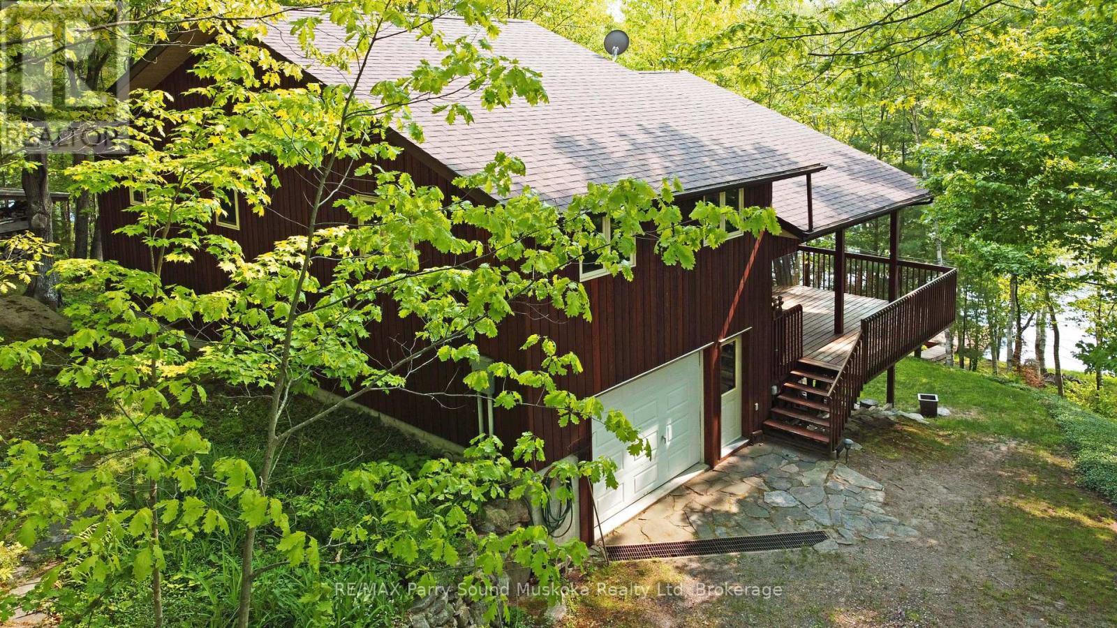 Double garage w workshop - 38 Shebeshekong Estates Road S, Carling, ON - Outdoor