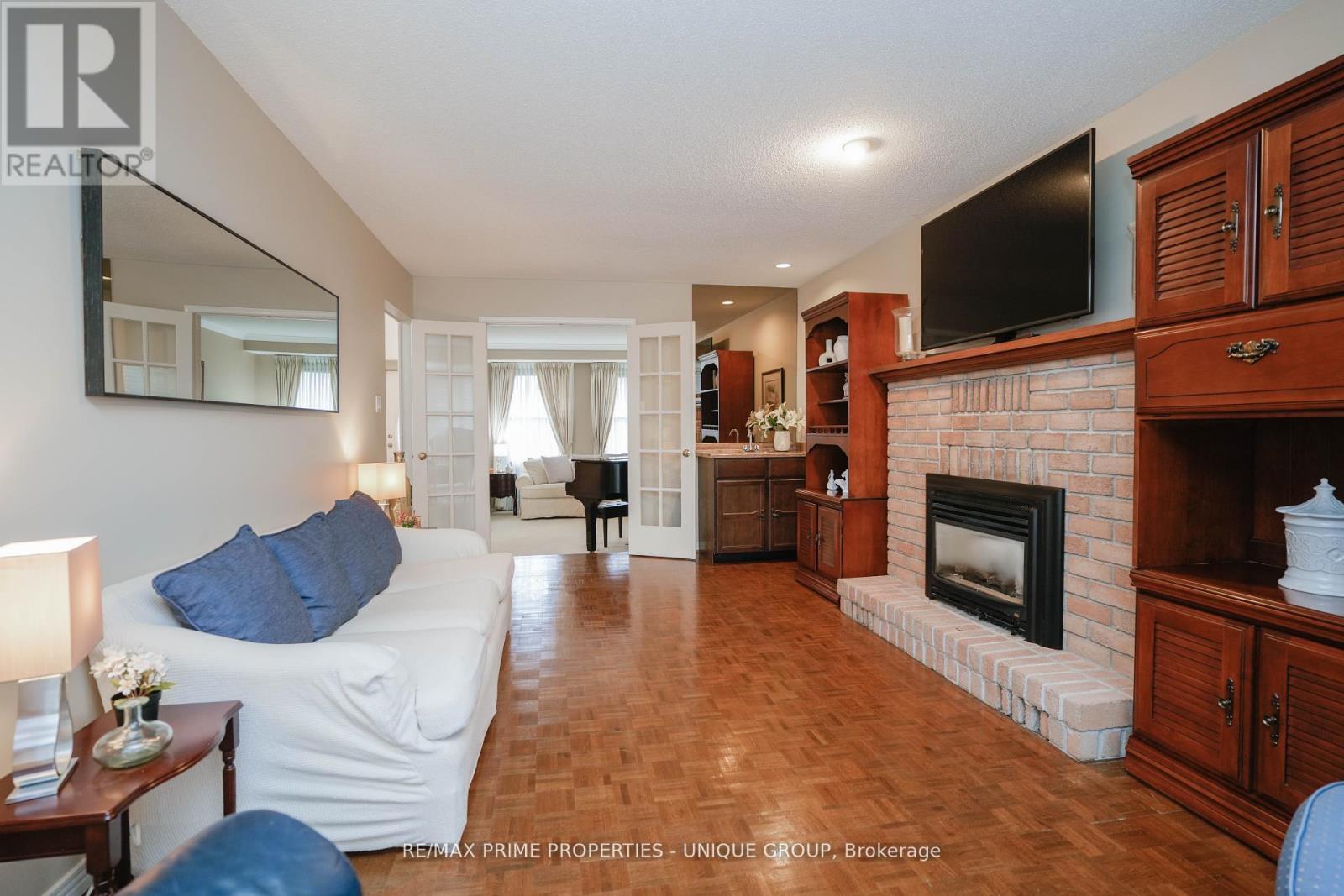 9 Longwater Chase, Markham, ON - Indoor Photo Showing Living Room With Fireplace