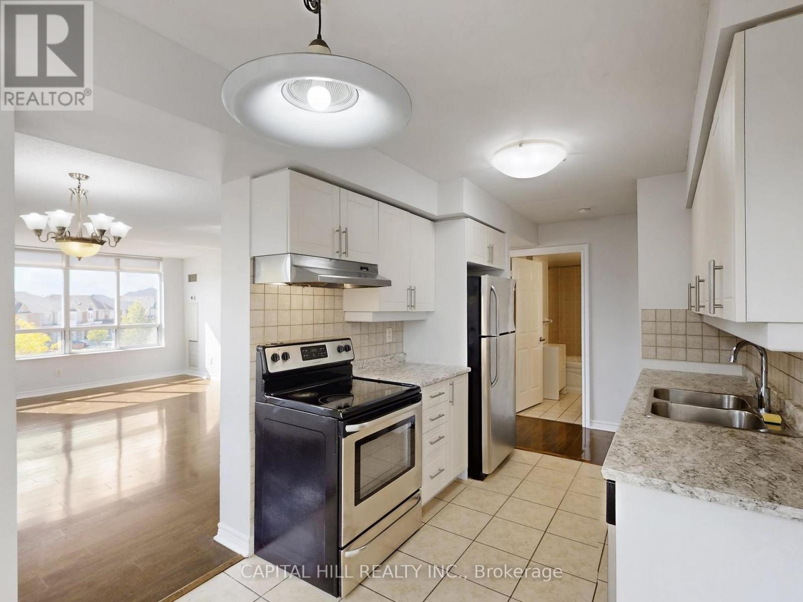 312 - 710 Humberwood Boulevard, Toronto, ON - Indoor Photo Showing Kitchen With Double Sink