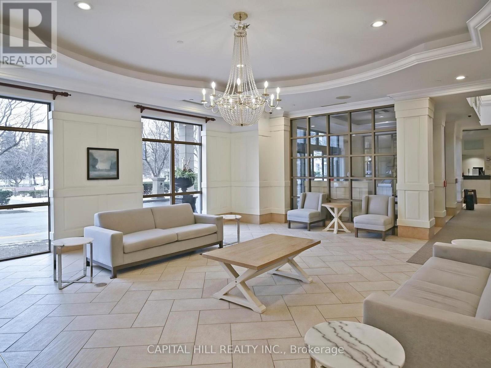 312 - 710 Humberwood Boulevard, Toronto, ON - Indoor Photo Showing Living Room