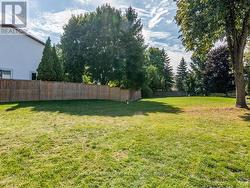 Condo's common area behind house. Park like settin -