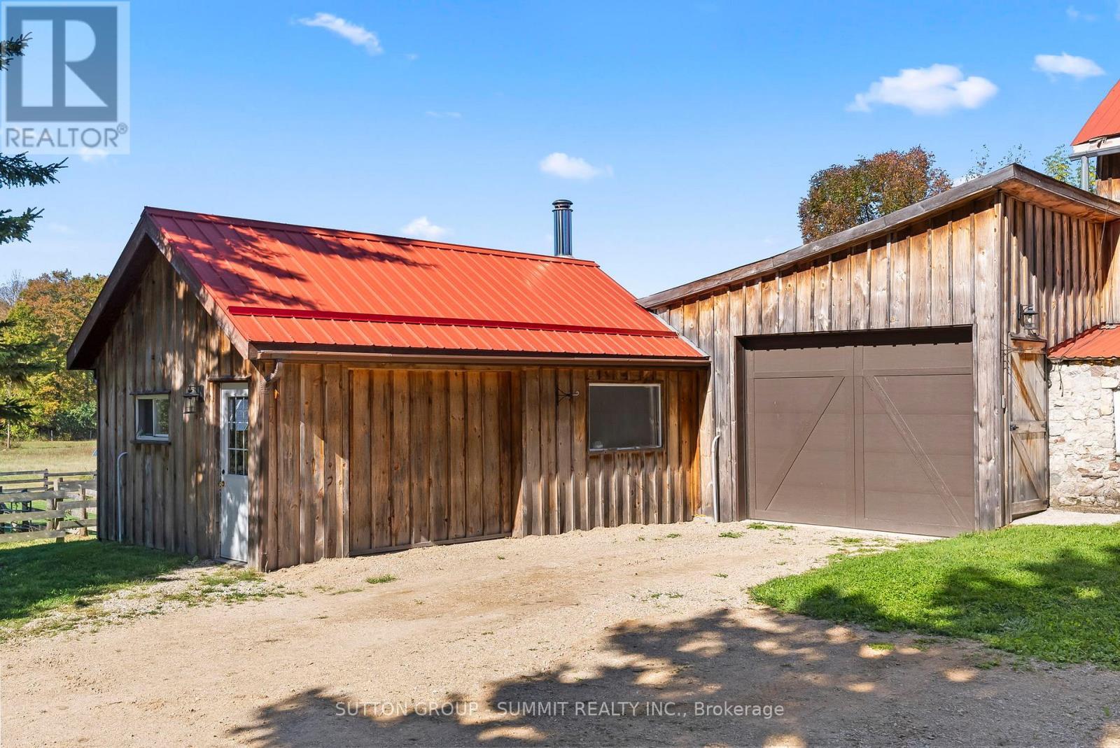 Heated garage and shop - 502349 10 Concession, West Grey, ON - Outdoor With Exterior