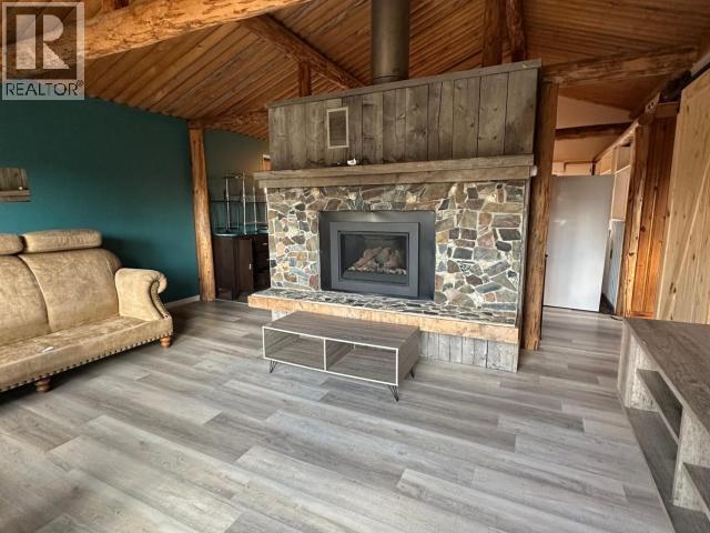119 Alsek Crescent, Haines Junction, YT - Indoor Photo Showing Living Room With Fireplace