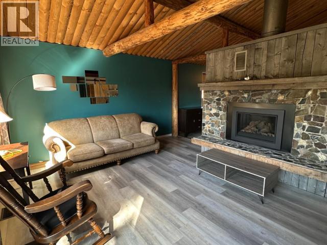 119 Alsek Crescent, Haines Junction, YT - Indoor Photo Showing Living Room With Fireplace