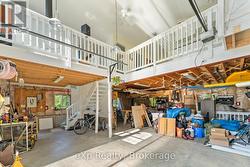 Lower Level Garage w In Floor Hear -