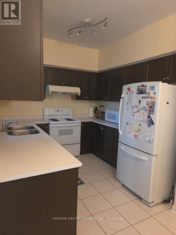 6 - 15 St Moritz Way, Markham, ON - Indoor Photo Showing Kitchen With Double Sink