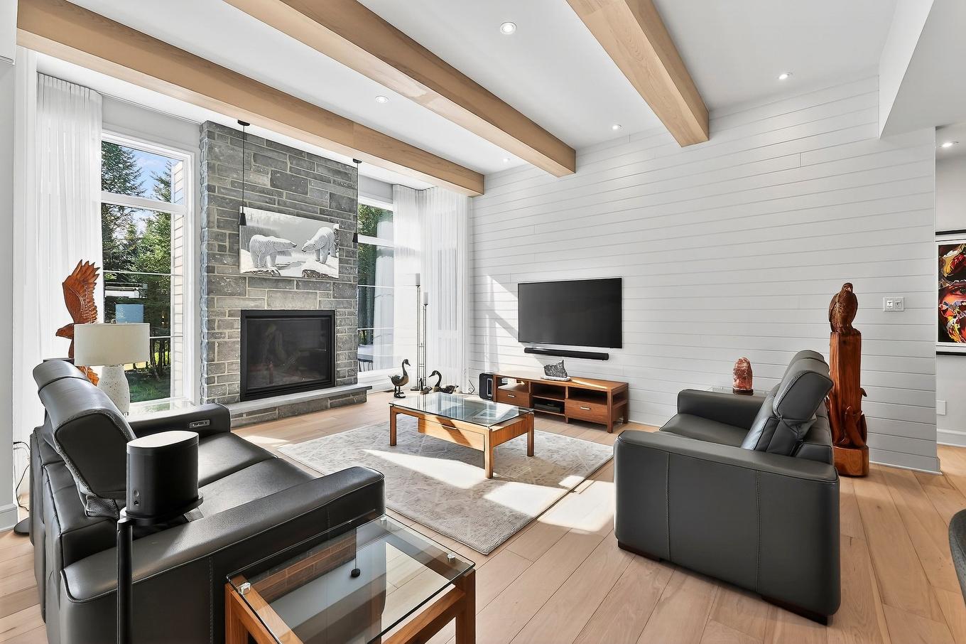 Living room - 1124 Ch. Du Massif, Piedmont, QC - Indoor Photo Showing Living Room With Fireplace