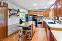 Huge kitchen with upgraded appliances. -