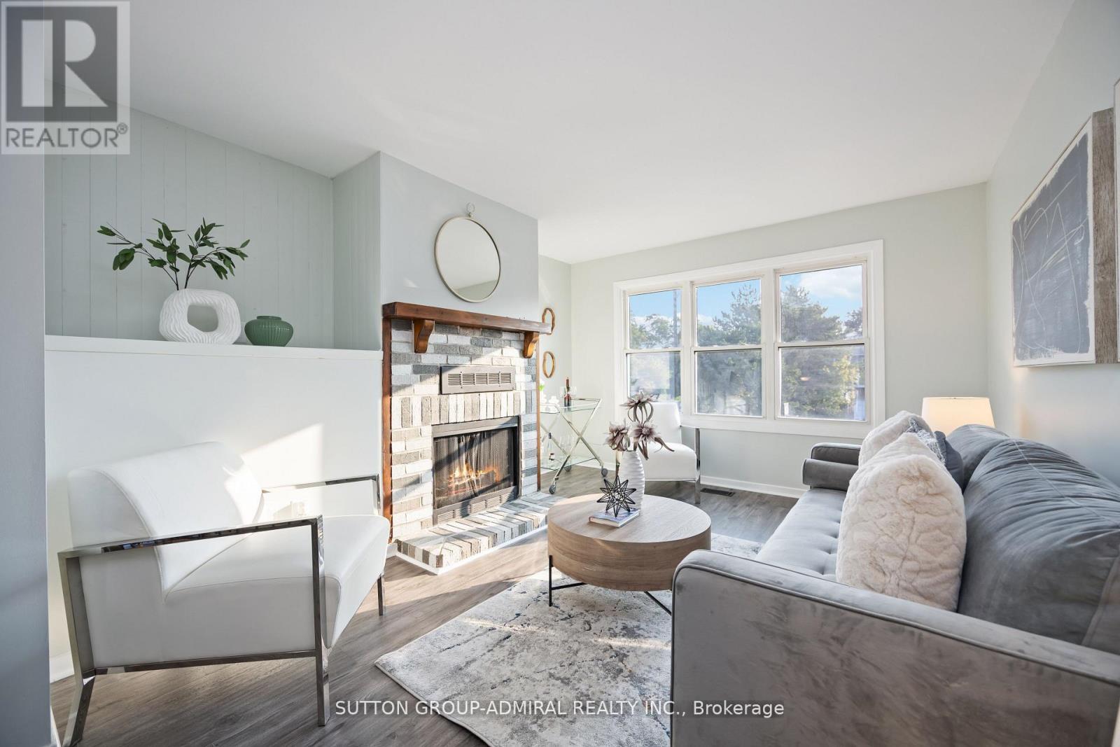 12 Tilburn Place, Toronto, ON - Indoor Photo Showing Living Room With Fireplace