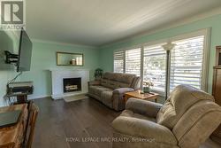 Bright living room california shutters -