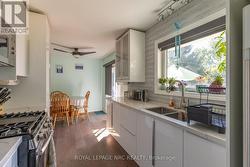 Huge window sink overlooking yard -