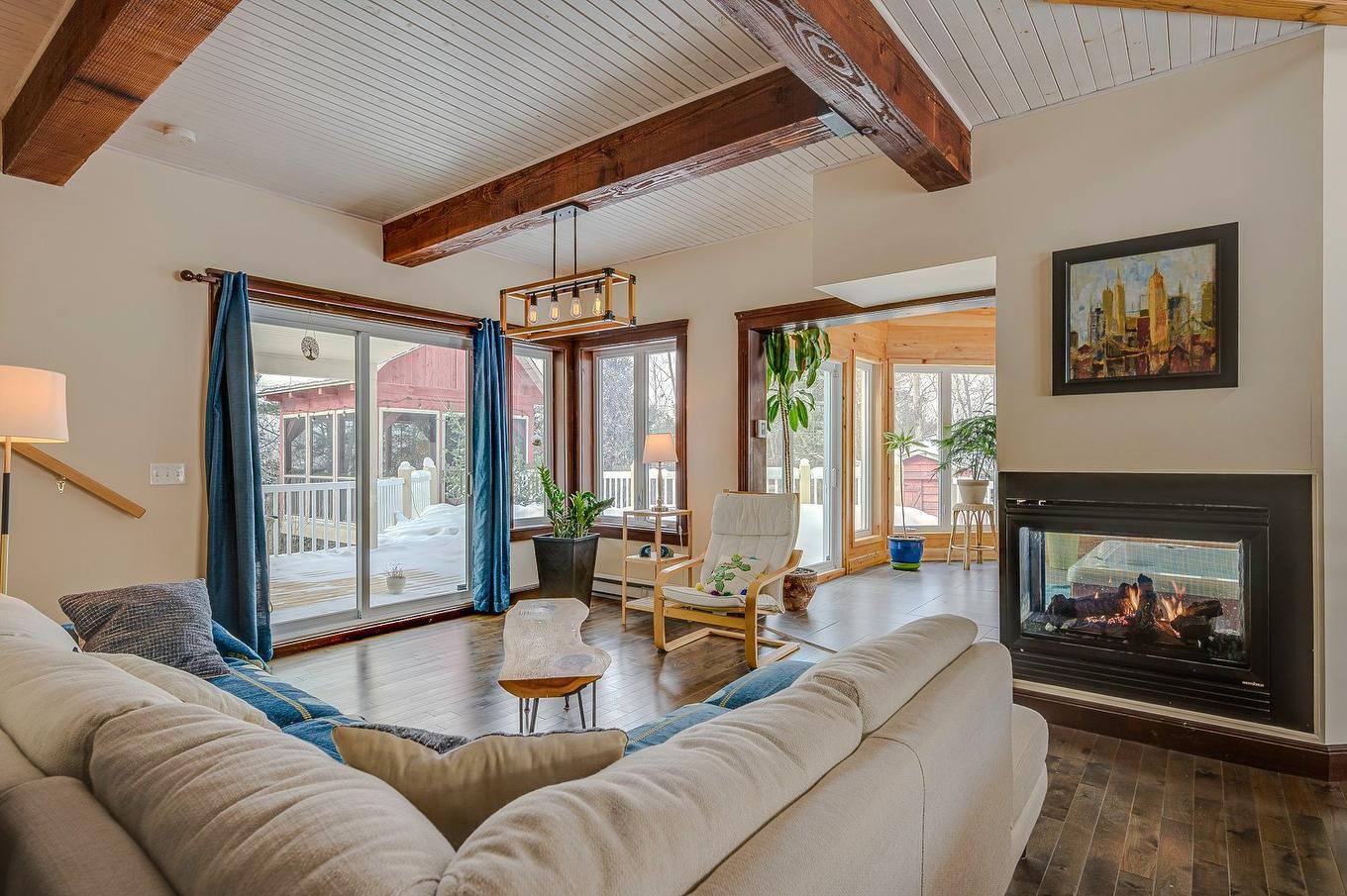 Living room - 920 Rue Du Boisé, Sainte-Adèle, QC - Indoor Photo Showing Living Room With Fireplace