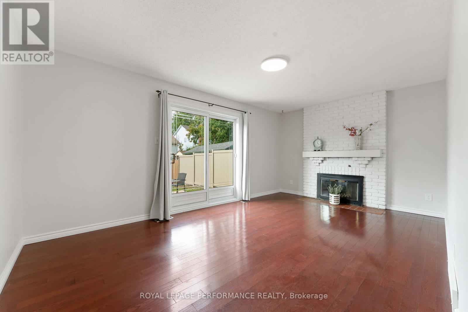 6345 Mattice Avenue N, Ottawa, ON - Indoor Photo Showing Living Room With Fireplace