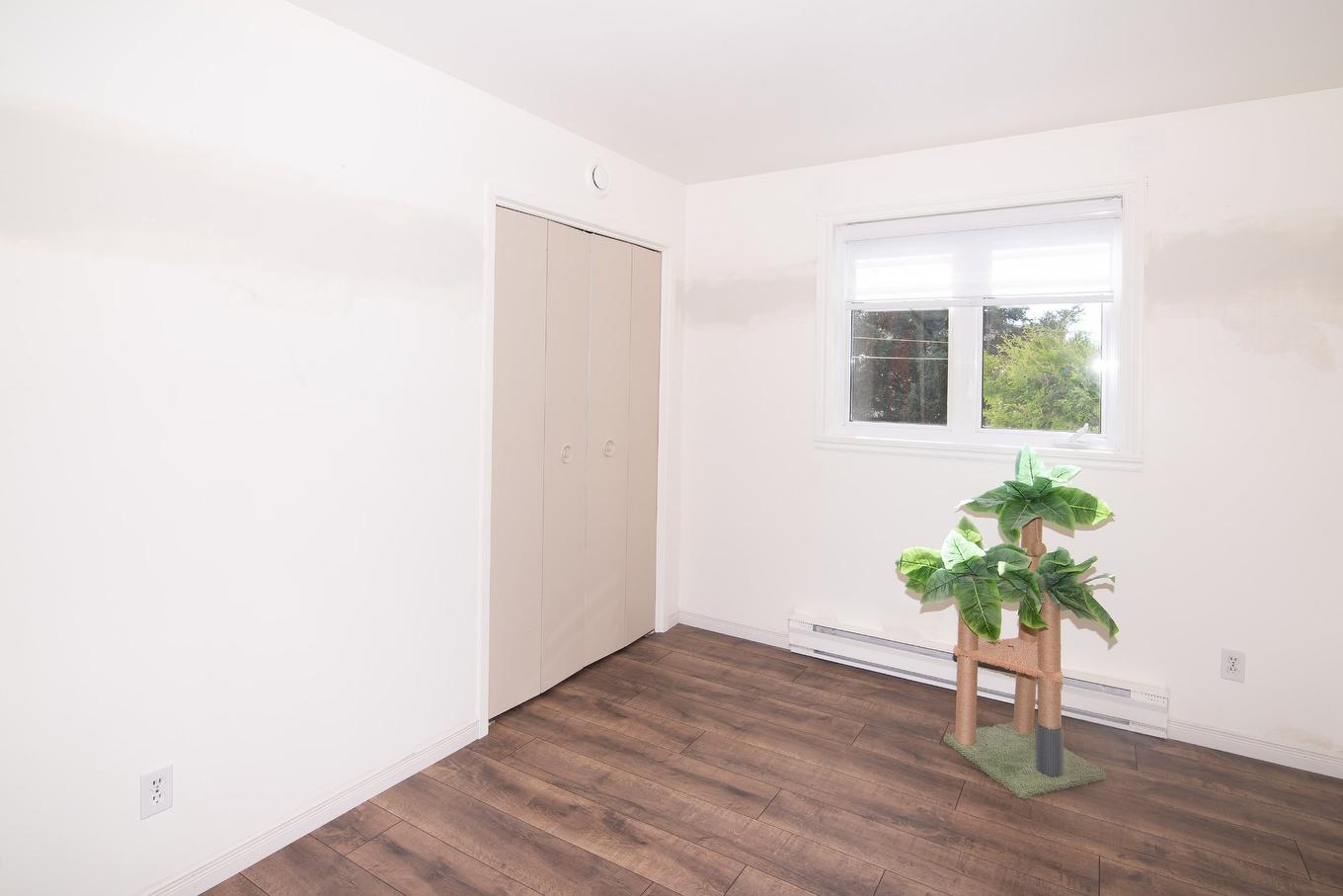 Chambre à coucher - 20 Rue Charles-Eugène-Dubé, Rivière-Du-Loup, QC - Indoor Photo Showing Other Room