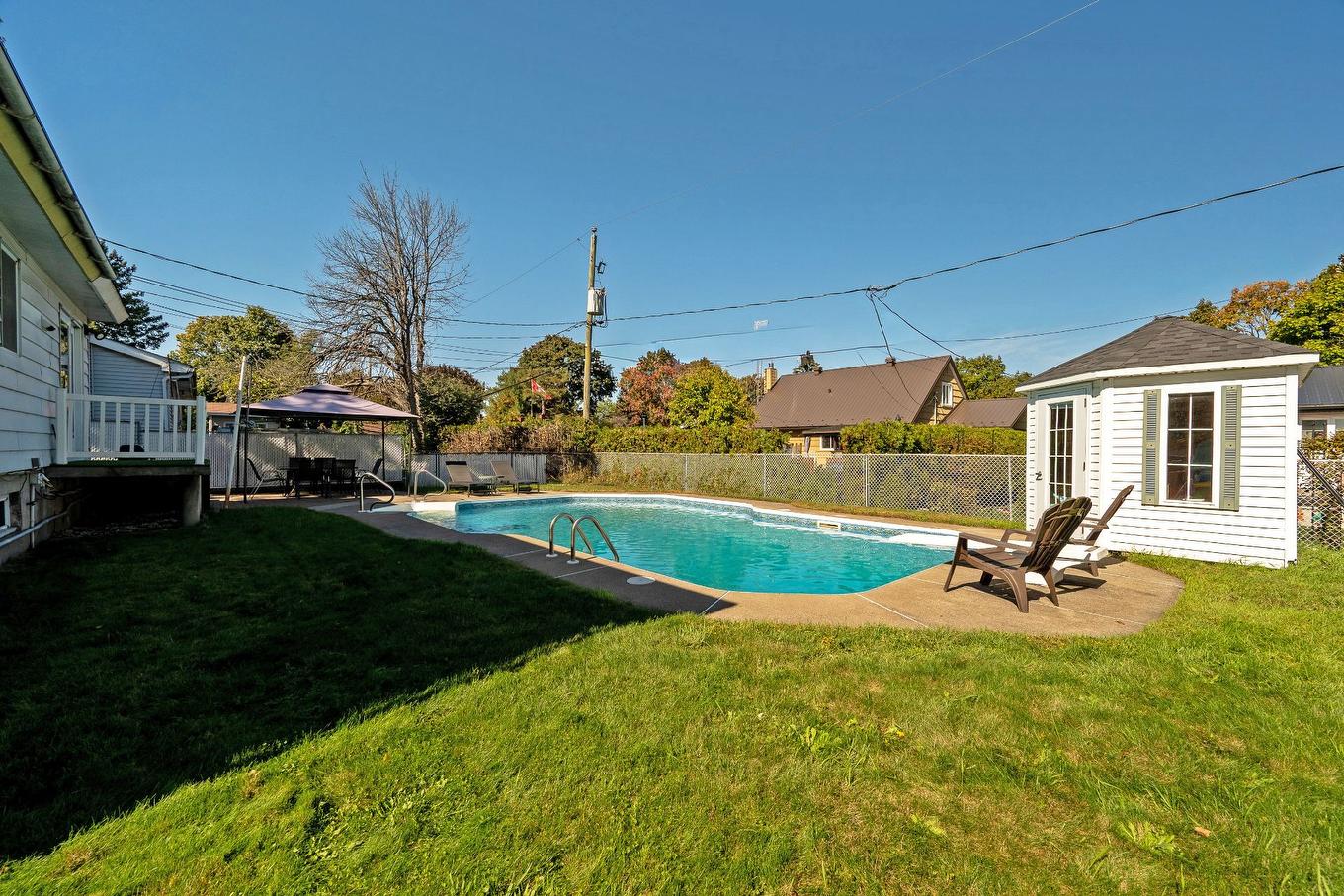 Backyard - 173 Rue Des Marguerites, Châteauguay, QC - Outdoor With In Ground Pool With Backyard