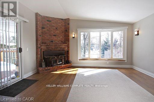 14 Oceanic Drive, Hamilton, ON - Indoor Photo Showing Living Room With Fireplace